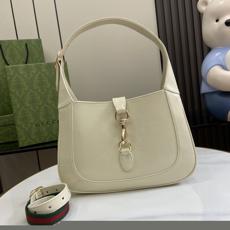 G*u*i top handle bags